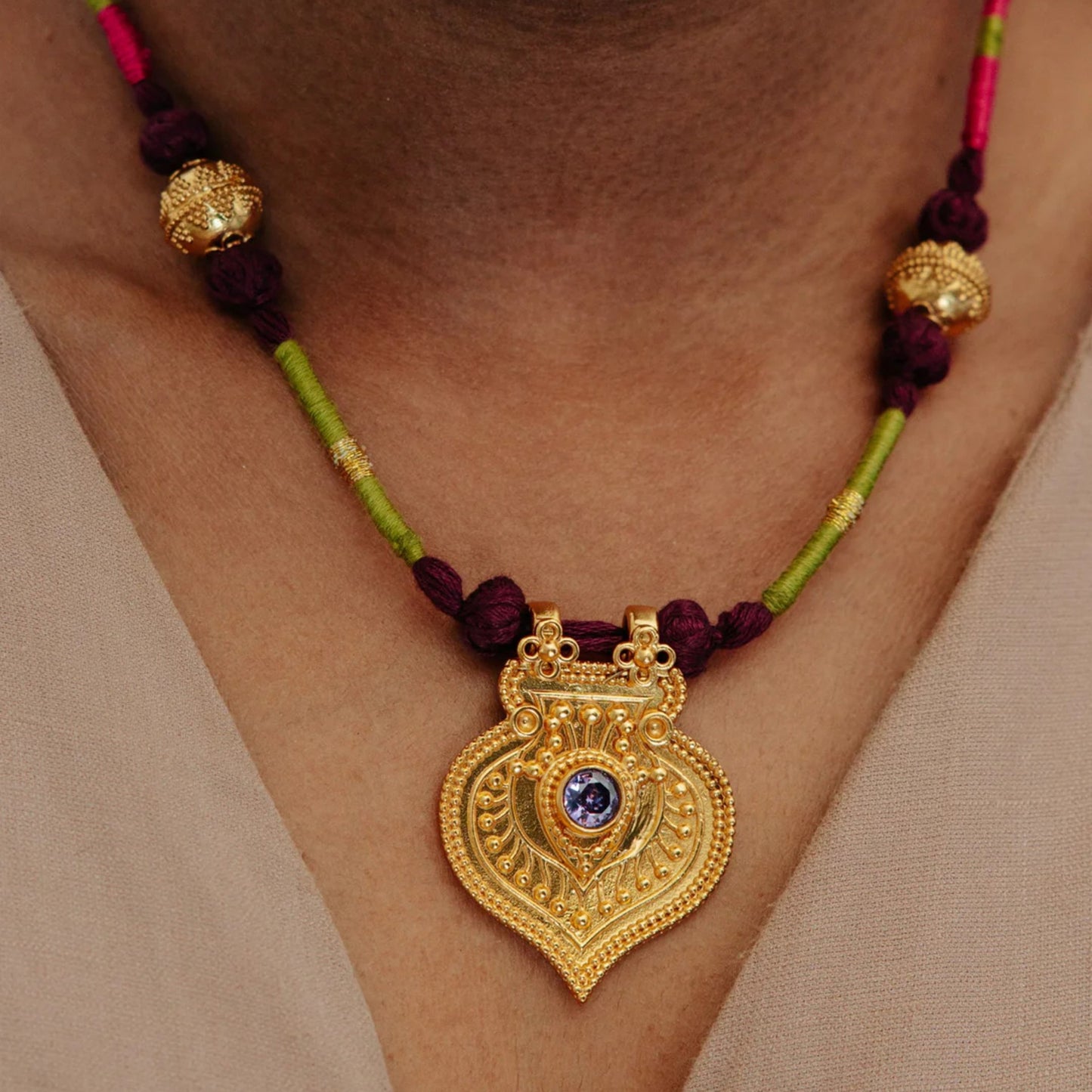 Stainless Steel Necklace With An Evil Eye Disc Pendant And A Color-retaining Cord