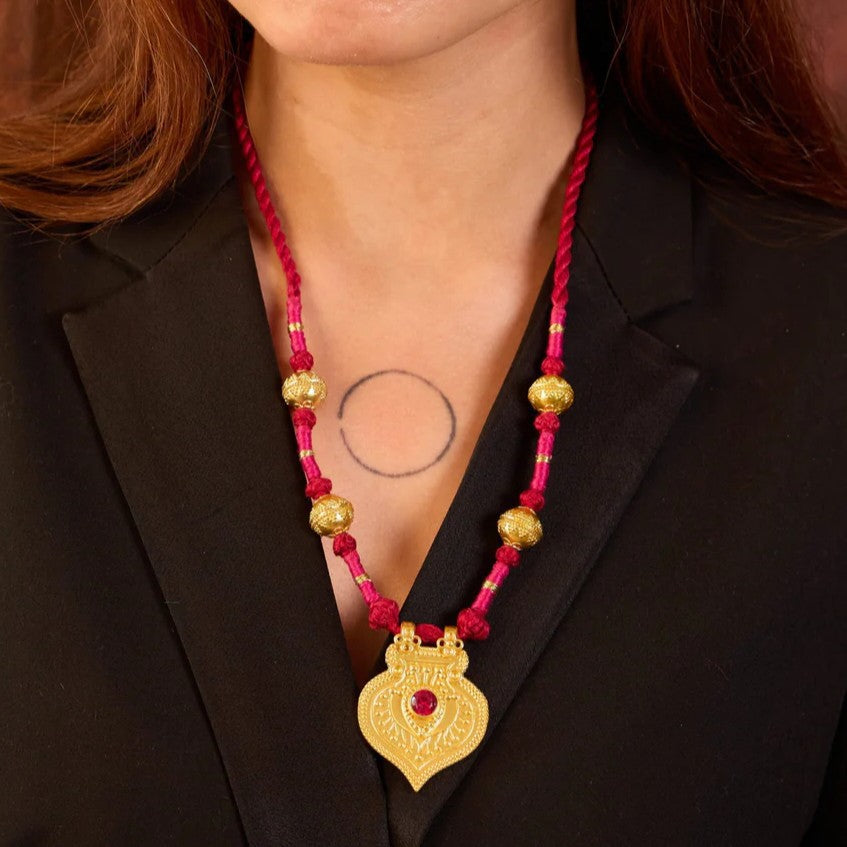 Stainless Steel Necklace With An Evil Eye Disc Pendant And A Color-retaining Cord