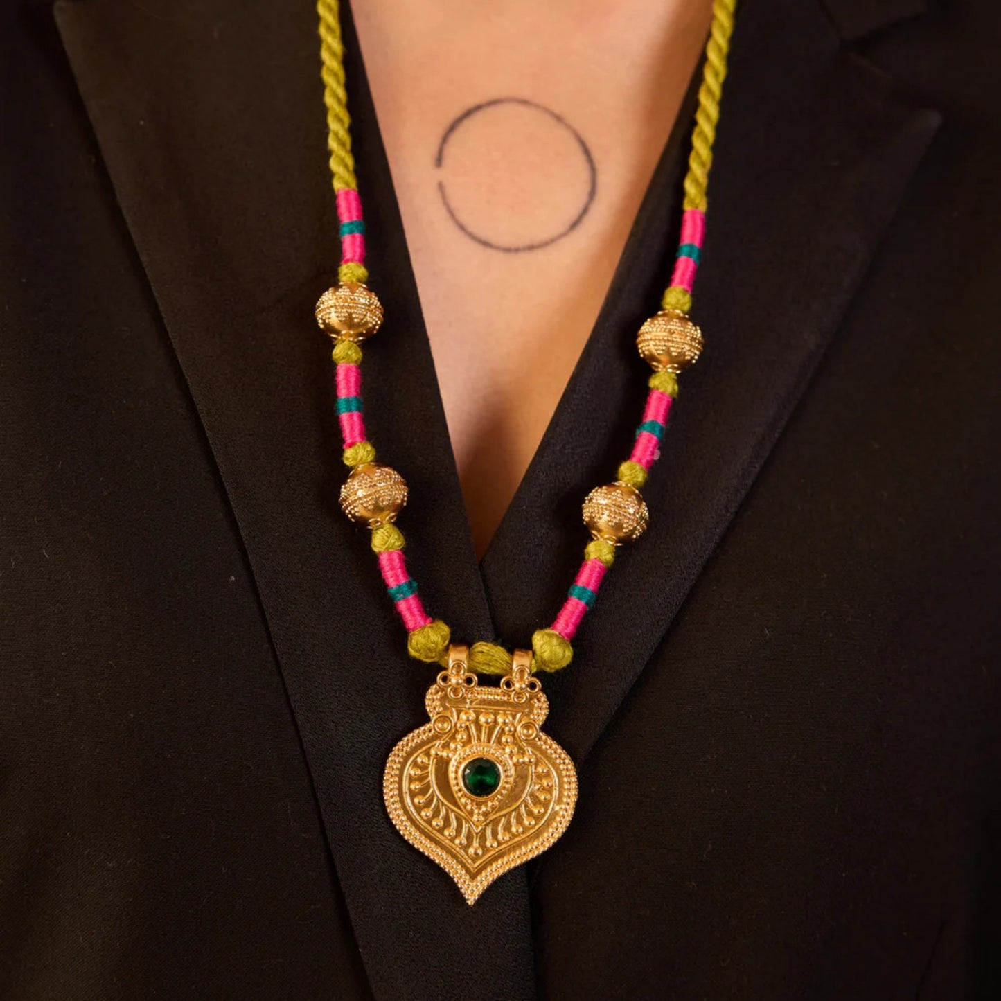 Stainless Steel Necklace With An Evil Eye Disc Pendant And A Color-retaining Cord