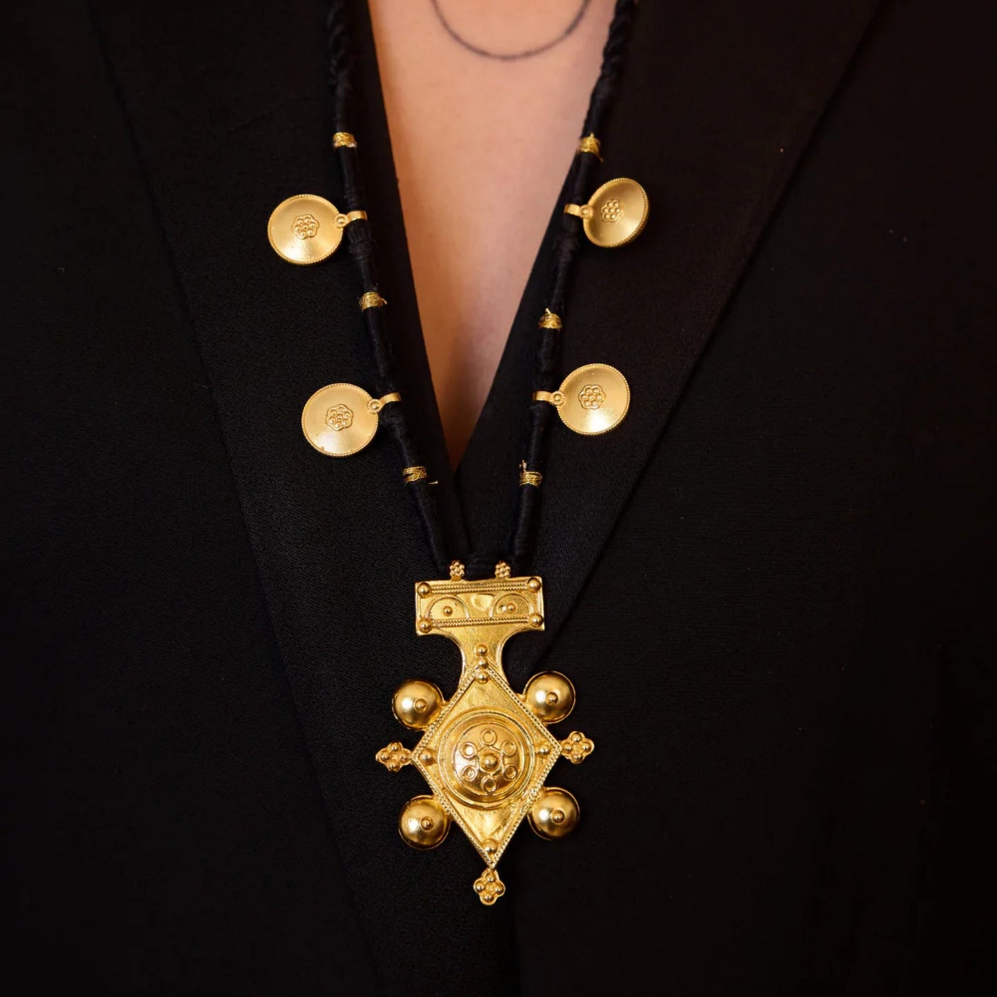 Stainless Steel Necklace With An Evil Eye Disc Pendant And A Color-retaining Cord