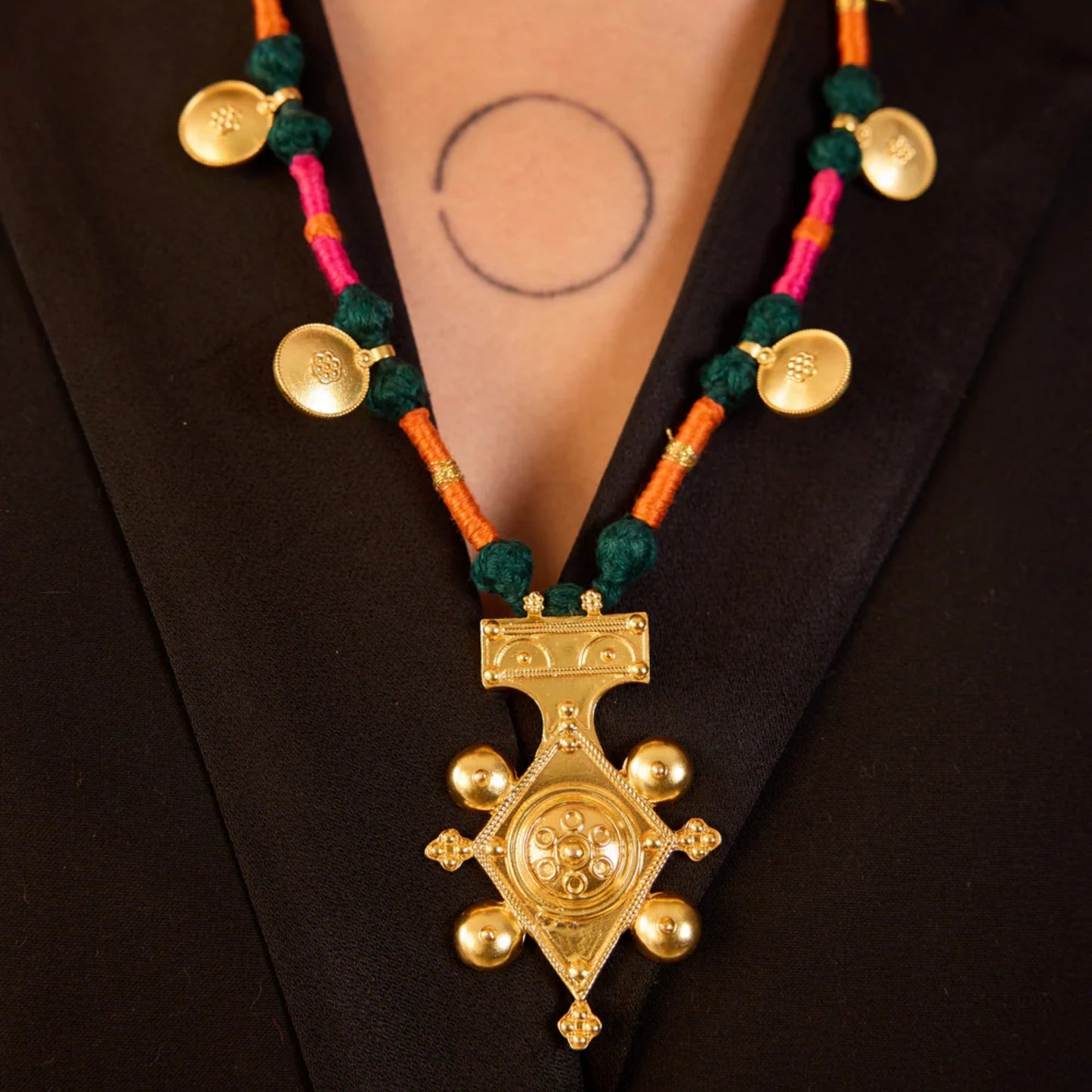 Stainless Steel Necklace With An Evil Eye Disc Pendant And A Color-retaining Cord